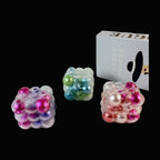 Aurora Bubble Cube Squishy - original product photo on black