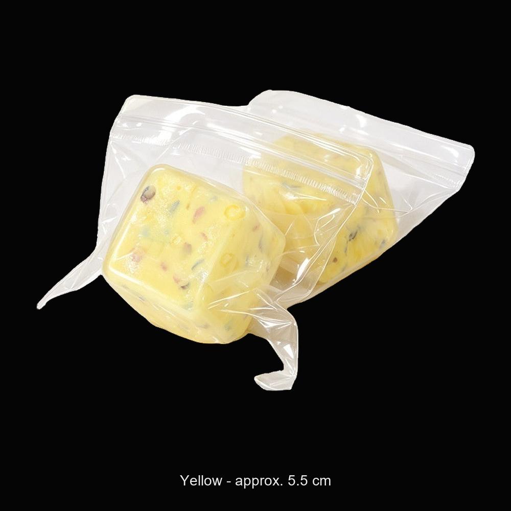 Confetti Ice Cube Squishy - Yellow - original product photo on black
