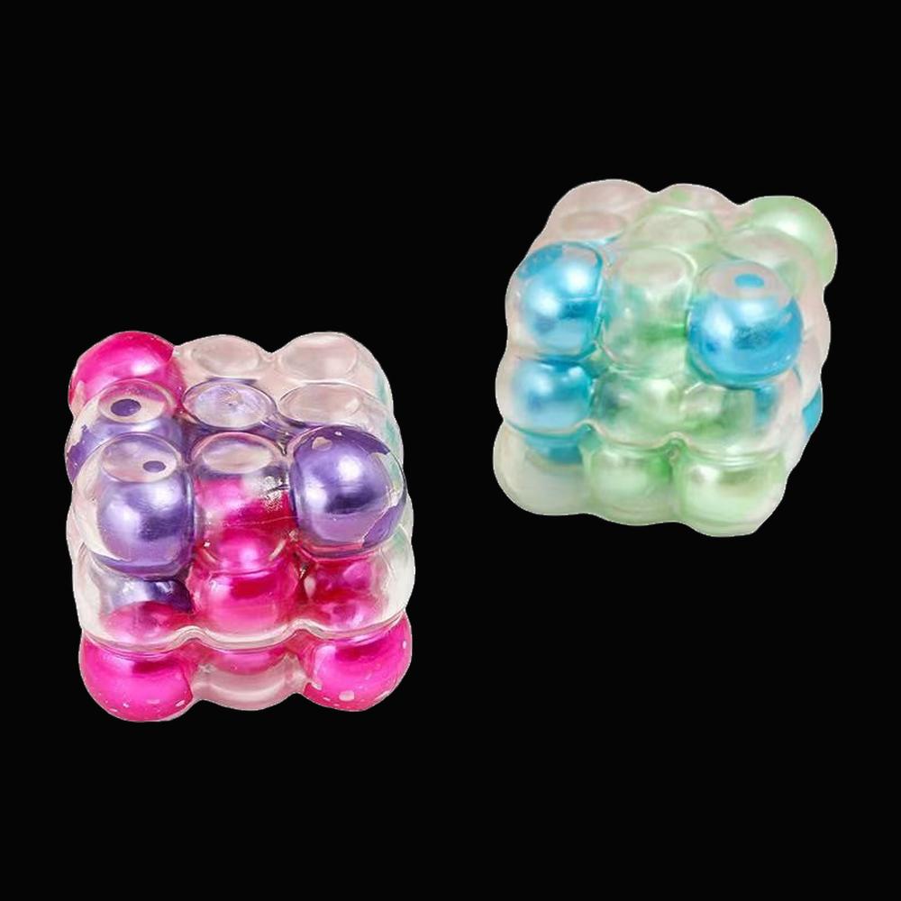 Aurora Bubble Cube Squishy - original product photo on black