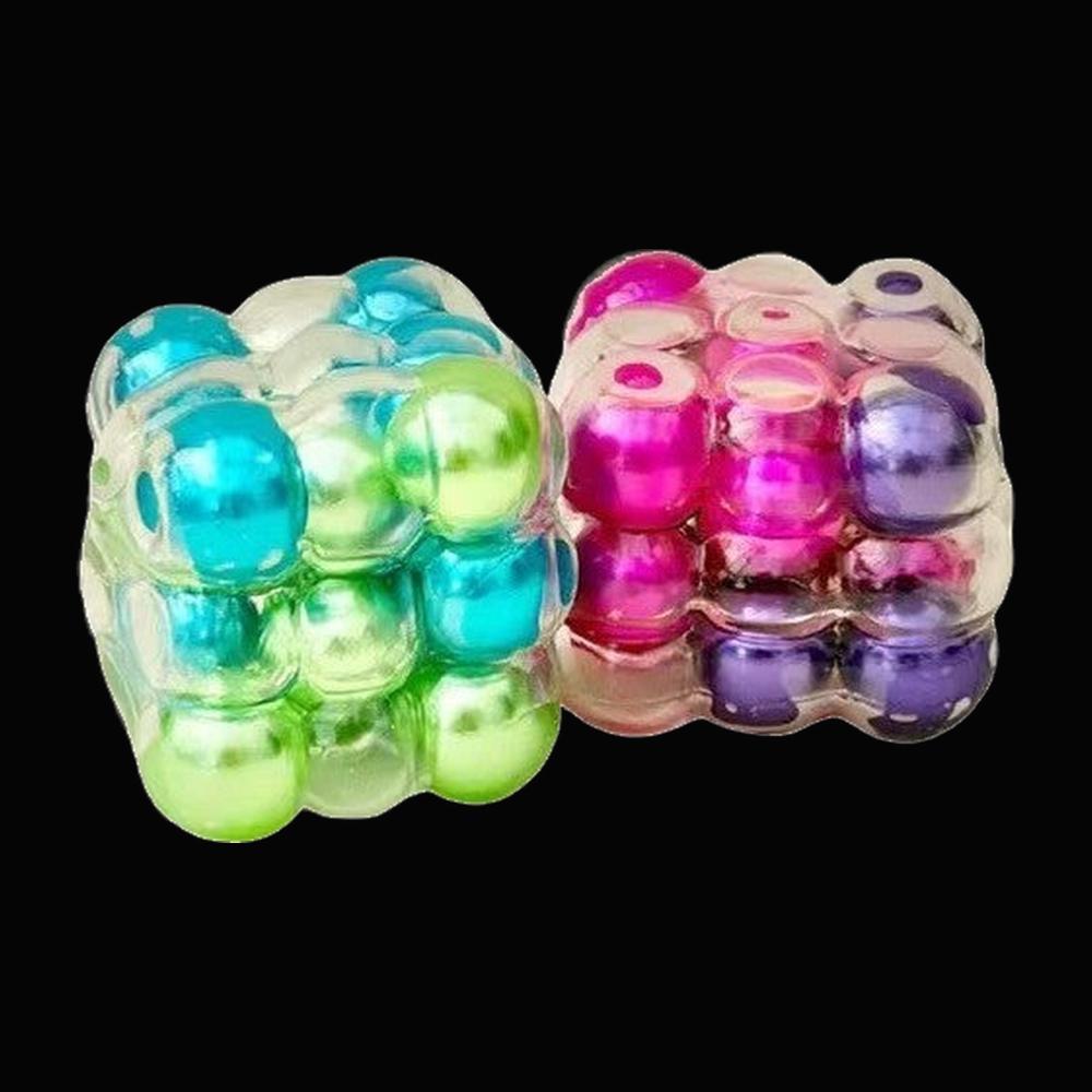 Aurora Bubble Cube Squishy - original product photo on black